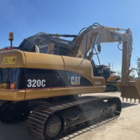 Chargeuse industrielle robuste haute performance Cat 320C pour la manutention et le stockage de matériaux de construction commerciaux à grande échelle