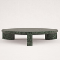 Table basse ronde en marbre vert, pieds en bloc massif, sculpture minimaliste, table centrale pour salon, maison de rêve