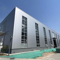 Almacén de estructura de acero industrial ligero prefabricado libre de diseño moderno para proyectos de construcción de edificios de metal de casa