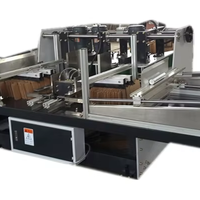 Machine automatique de collecte, de pressage et d'empilage de cartons pour ligne d'assemblage de boîtes en carton ondulé