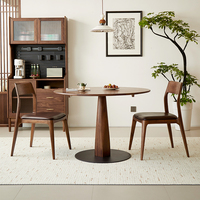 Table à manger moderne en noyer noir massif, design rond peu encombrant pour les petits espaces résidentiels et l'hôtellerie