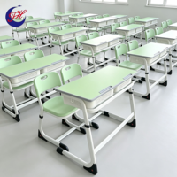 Mobilier scolaire de haute qualité pour les salles de classe : bureaux et chaises doubles en métal réglables en hauteur pour les élèves.