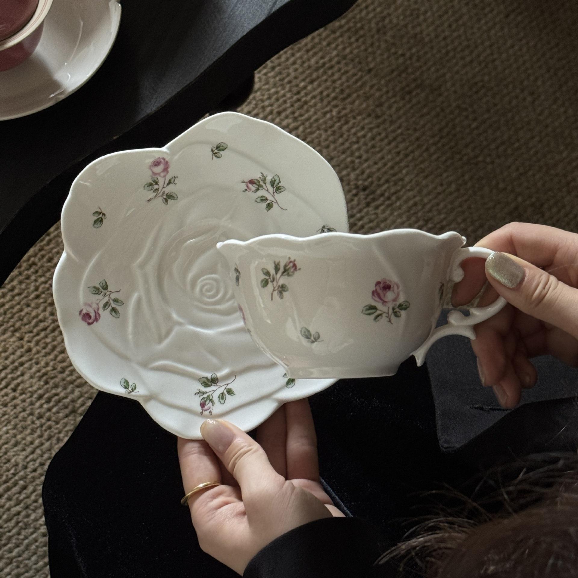 Rose cups and saucers