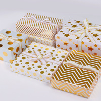 Papier d'emballage cadeau de luxe en feuille d'or épaisse de haute qualité à pois à rayures dessins d'étoiles géométriques estampage à chaud rouleaux d'emballage cadeau de tous les jours
