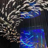 Lustre LED sur mesure pour projets d'ingénierie, grand luminaire décoratif en verre transparent avec plumes, idéal pour hôtels, villas, escaliers et halls d'entrée