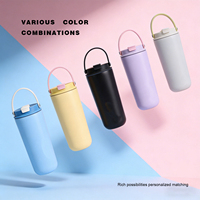 Gobelet isotherme OEM personnalisé à double paroi pour café chaud et froid, facile à transporter, vente en gros, 600 ml, en acier inoxydable, portable pour la randonnée et les voyages