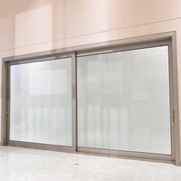 Portes de sécurité extérieures en aluminium à double vitrage sur mesure Foshan, finition en PVC, surface silencieuse, coulissant pour villa