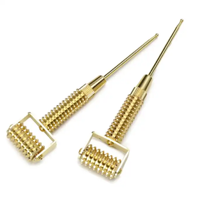 Rouleau d'instrument de beauté Barre d'or Soins de santé chinois <span class=keywords><strong>Acupuncture</strong></span> Rouleau de beauté du <span class=keywords><strong>visage</strong></span> - Product Image 1