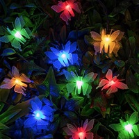 Lichtsnoer met vlindervormige warme LED-lampjes op koperdraad voor kamerdecoratie