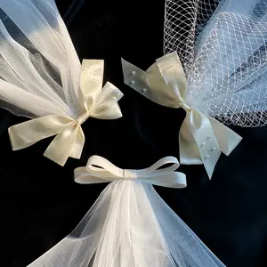 أزياء الزفاف إكسسوارات الشعر حجاب الزفاف القوس عقدة مقاطع الشعر للعروس
