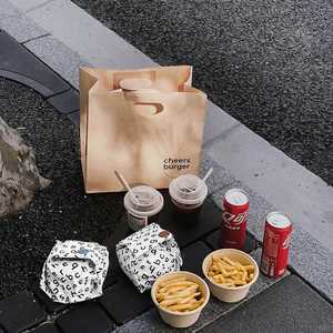 Sacs en papier kraft jetables écologiques et recyclables, conçus sur mesure avec poignées découpées pour l'emballage des hamburgers - Product Image 1