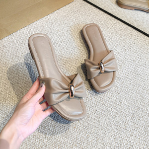 Nuevas sandalias planas transpirables y suaves de primavera/verano para mujer con lazo y hebilla metálica, diseño cómodo y elegante para exteriores. - Product Image 4
