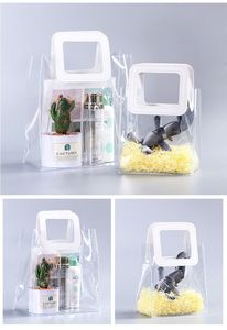 Sac cadeau fantaisie <span class=keywords><strong>pas</strong></span> <span class=keywords><strong>cher</strong></span> en plastique pvc transparent <span class=keywords><strong>mariage</strong></span> souvenir bougie cosmétique cadeau ensemble sac fourre-tout avec poignée carrée ronde en cuir - Product Image 2