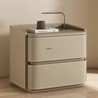 Table de chevet moderne de luxe léger au design créatif pour chambre à coucher