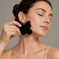 Outil de massage facial en pierre d'obsidienne noire en gros, outil de soin de beauté en cristal naturel pour le raclage Gua Sha