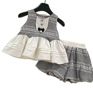 2025 nuova <span class=keywords><strong>bambina</strong></span> 2 pezzi <span class=keywords><strong>nero</strong></span> bianco Plaid Pom volant camicia senza maniche + pantaloncini Set di abbigliamento 2-8 anni - Product Image 5