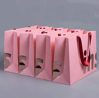 Sac en papier rose personnalisé imprimé sur mesure avec poignée en ruban pour le commerce de détail