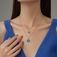 Chaîne de pull élégante pour femme, motif planète univers, en acier titane plaqué or 18 carats, design de niche, pendentif style INS, nouvelle collection 2026