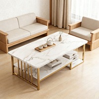 Table d'appoint de style avec plateau en verre et pieds en métal pour salon