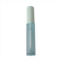 Tube de gloss à lèvres rond en plastique transparent avec applicateur magique et option de logo personnalisé pour l'emballage cosmétique