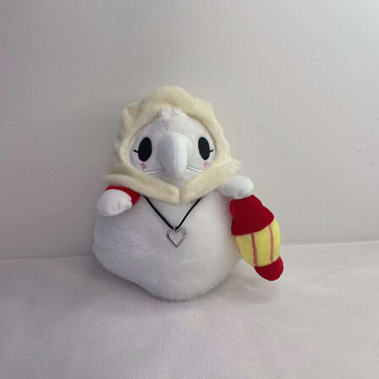 juguete de peluche de cuervo blanco y negro lindo y seguro