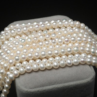 Vente en gros de perles d'eau douce naturelles blanches de qualité AAA+ de 6 mm, presque rondes, avec trou percé pour la fabrication de bijoux