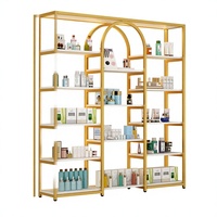 Support d'affichage cosmétique en métal haut de gamme, vitrine à parfums pour boutique de beauté