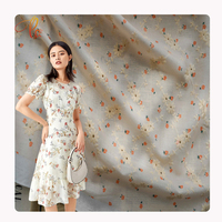 Haute qualité 100% Polyester broderie tissu doux fleur florale en mousseline de soie brodé oeillet tissu pour robe de mariée