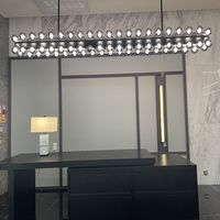 Lustre moderne ovale long en verre à bulles multiples pour la décoration intérieure des hôtels, des restaurants et des bars