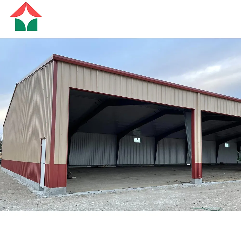 low cost cheap price prefabricated metal steel structure warehouse using glass wool insulation sandwich panel wall and roof.