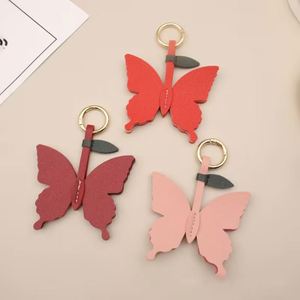 <b>Cute</b> Vibrant Color Butterfly Keychain PU Leather <b>Purse</b> Charm for Handbags Key Charm Unique Accessory - Product Image 2