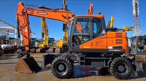 Excavatrice sur pneus d'occasion Daewoo Doosan DXW140 DX150W DX165W Modèle 2023 16t, godet 0,5m, moteur, boîte de vitesses, engrenages en stock, seconde main - Product Image 3