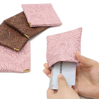 Porte-monnaie miniature en PU à motif floral embossé vintage, fermeture à ressort, étui pour écouteurs, pochette à bijoux