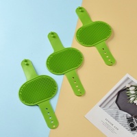 Peigne multifonctionnel en silicone pour animaux de compagnie Brosse de bain pour chien Gants de massage Outil d'épilation des chats Artifact de grattage des jambes de table