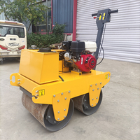 Compacteur routier à double tambour pour asphalte, béton et sols, à conducteur marchant à pied
