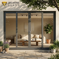 Porte patio coulissante double vitrage anti-ouragan Miami Dade, aluminium noir, grand balcon vitré, villa de luxe