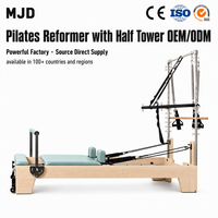 Reformer Pilates en bois avec demi-tourneuse, structure en érable, machine d'entraînement Pilates pour la création de nouveaux studios et la vente au détail de matériel de fitness CE/SGS