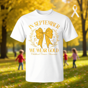 En septiembre usamos camisetas doradas con lazo Coquette para la concienciación sobre el cáncer infantil - Product Image 3
