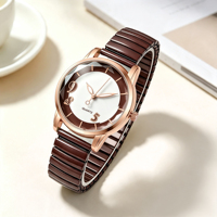 Montre de luxe en quartz pour femme, boîtier rond en alliage, bracelet extensible, design simple et élégant, personnalisable avec logo