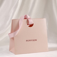 Ventes chaudes Sac à main en papier de qualité supérieure Couleur rose Ensemble d'emballage de bijoux avec sac et boîte Fabrication de sacs en papier personnalisés