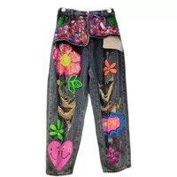 Jean en denim délavé vintage pour femme, avec motif floral à sequins colorés, déchiré et vieilli, coupe ample à jambe large
