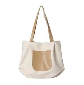 Bolso de lona moderno con dos correas para el hombro y cierre de broche, ideal para viajes de ocio y compras para mujeres. - Product Image 1