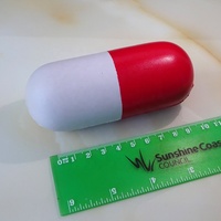 Balle anti-stress en forme de capsule en mousse PU
