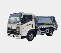 Camion compacteur d'ordures Howo 6 m³ 4x2 Diesel Moteur 3.0L Transmission manuelle Pompe Garantie 2 ans à vendre