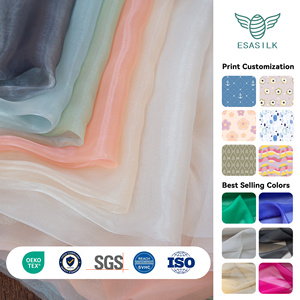 Tissu en <span class=keywords><strong>organza</strong></span> <span class=keywords><strong>de</strong></span> <span class=keywords><strong>soie</strong></span> transparente <span class=keywords><strong>de</strong></span> qualité 6A, largeur 140 cm (55 pouces), toucher sec et rigide, plusieurs couleurs en stock, MOQ 1 m pour robes <span class=keywords><strong>de</strong></span> luxe - Product Image 1