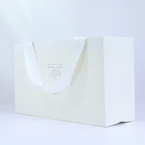 Belle grande chaussures de vêtements emballage cadeau sac en papier blanc de couleur unie de luxe avec votre propre logo