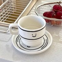 Ensemble tasse à café et soucoupe en céramique style coréen avec visage souriant mignon, tasse à cappuccino créative pour cadeau de café, vente en gros
