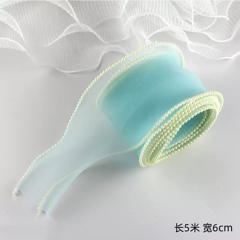 One piece of blue pearl yarn