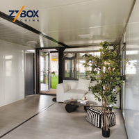 Casa Contenedor Expandible de 40 pies con Techo Asimétrico, Prefabricada, Modular, Amueblada, Color Gris, Retiro con Diseño de Hojas de Arce Otoñales