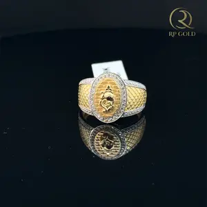 Luxury <b>gold</b> <b>mens</b> <b>ring</b> with oval design diamond border and detailed textured band featuring a bold traditional centerpiece - Product Image 1